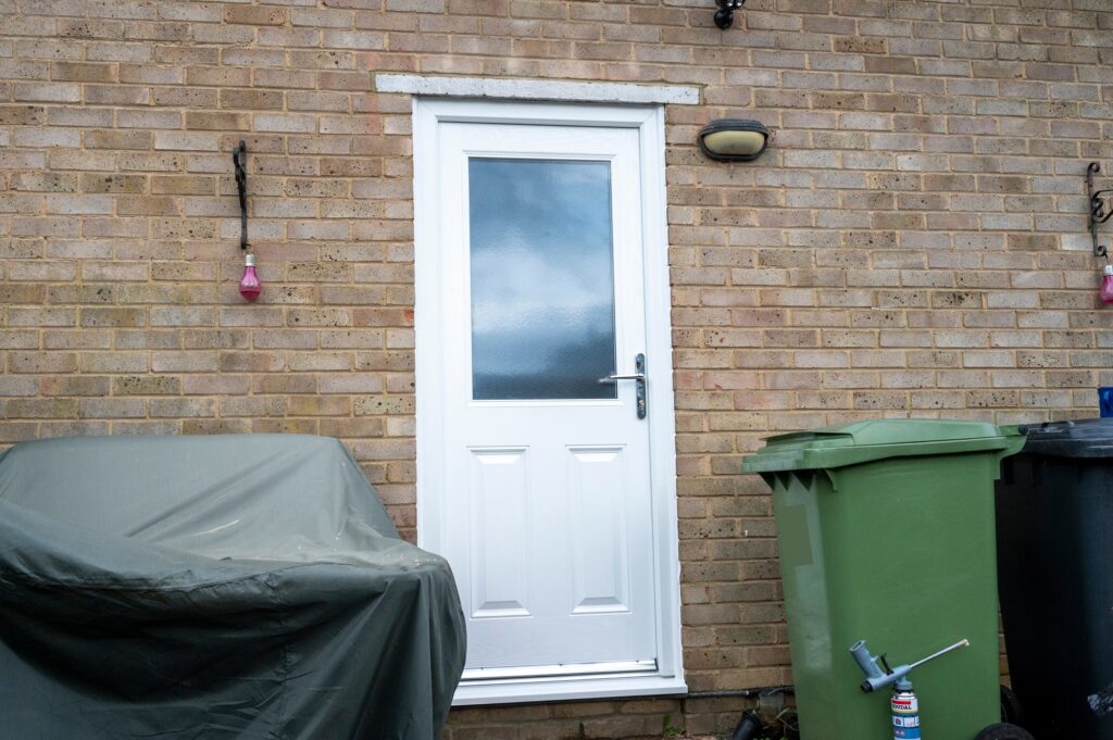 Photo of a new back door on the Queensway Estate, Wellingborough 