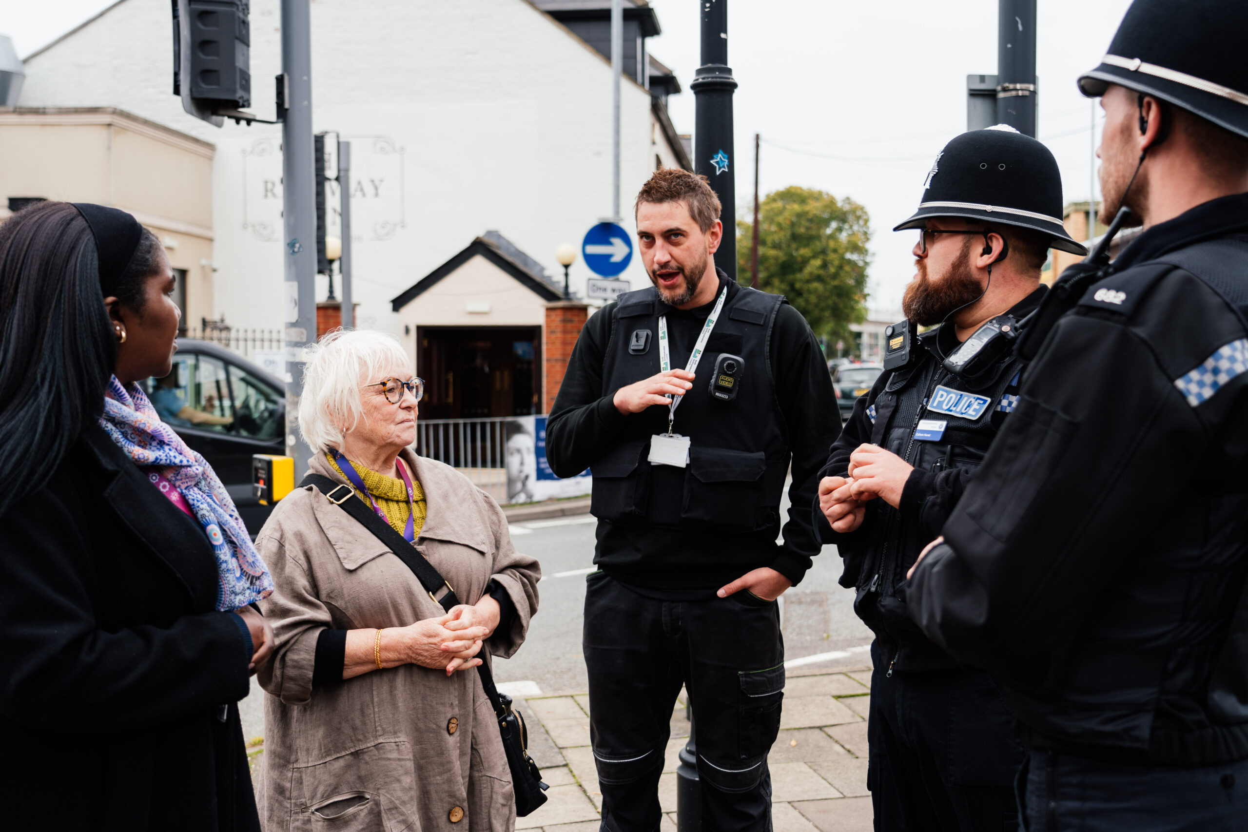 PFCC Danielle Stone talking on Rushden High Street with Deputy PFCC Marianne Kimani, two Neighbourhood Police Officers and NNC's Community Protection Engagement Officer Will Bolter