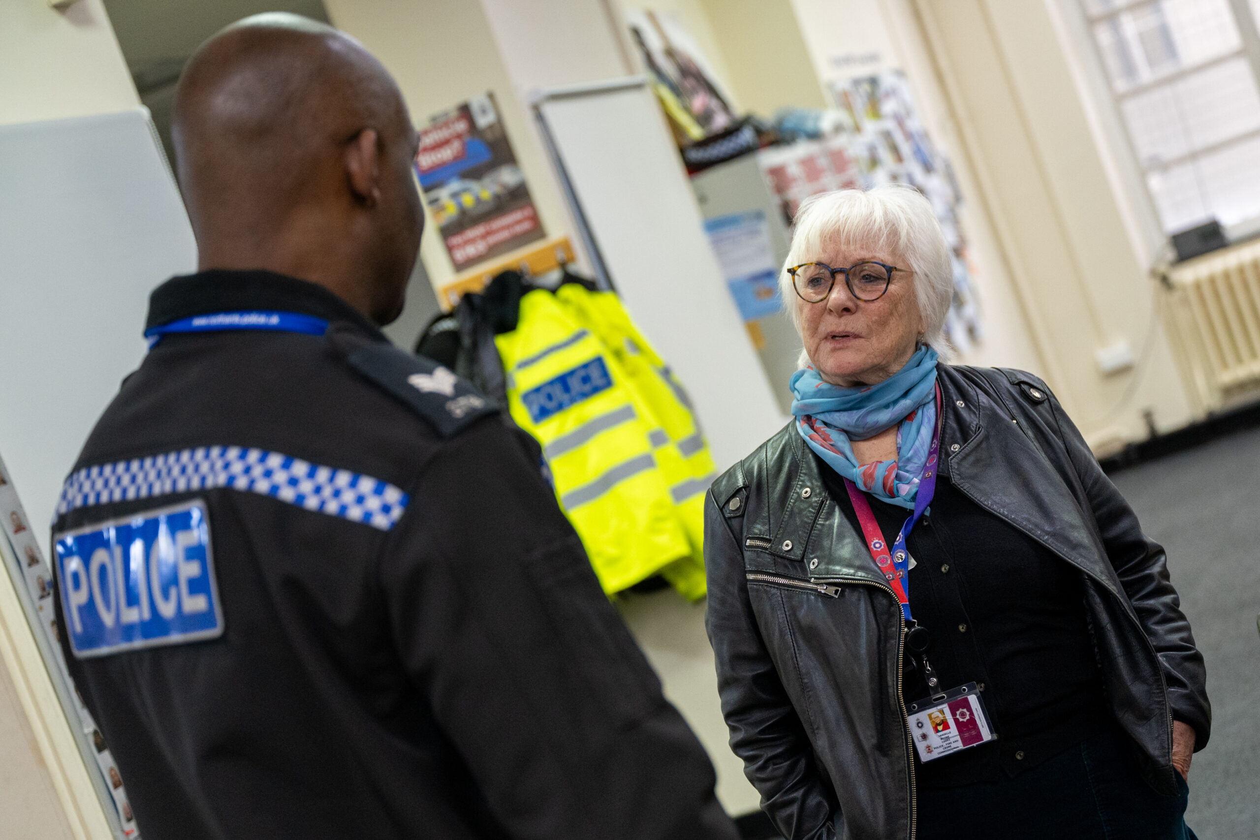 Police Fire and Crime Commissioner Danielle Stone speaks to a police officer at the new front desk in Campbell Square