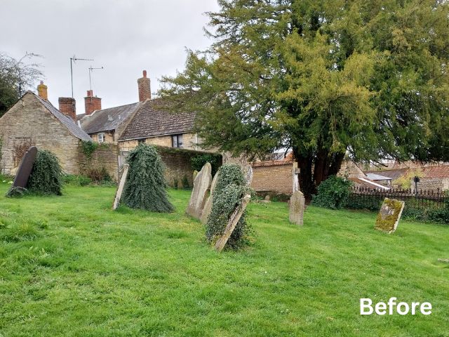 Overgrown churchyard with weathered, leaning gravestones partially covered in ivy on a grassy slope, stone buildings and a large tree in the background; the word ‘Before’ appears in the bottom right corner.