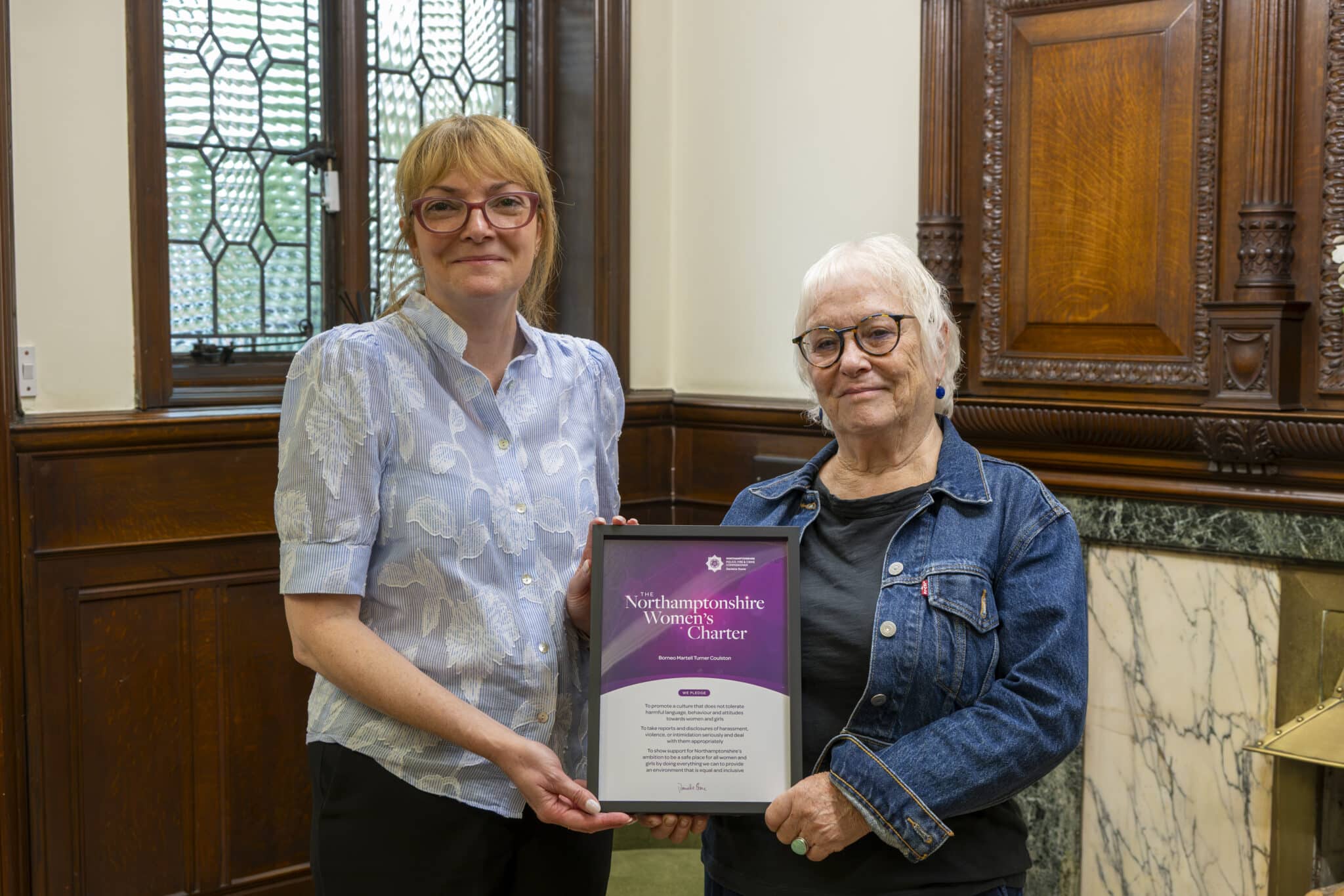 Danielle Stone presents Clare de Banke, the Managing Partner at Borneo Martell Turner Coulston LLP, with their certificate for signing the Northamptonshire Women’s Charter